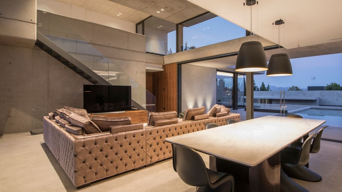 A picture that displays the interconnected dining and living area in a seamless manner.