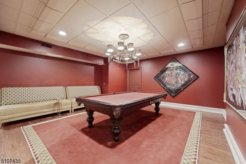 The house features a recreation room to play indoor games for relaxation.
