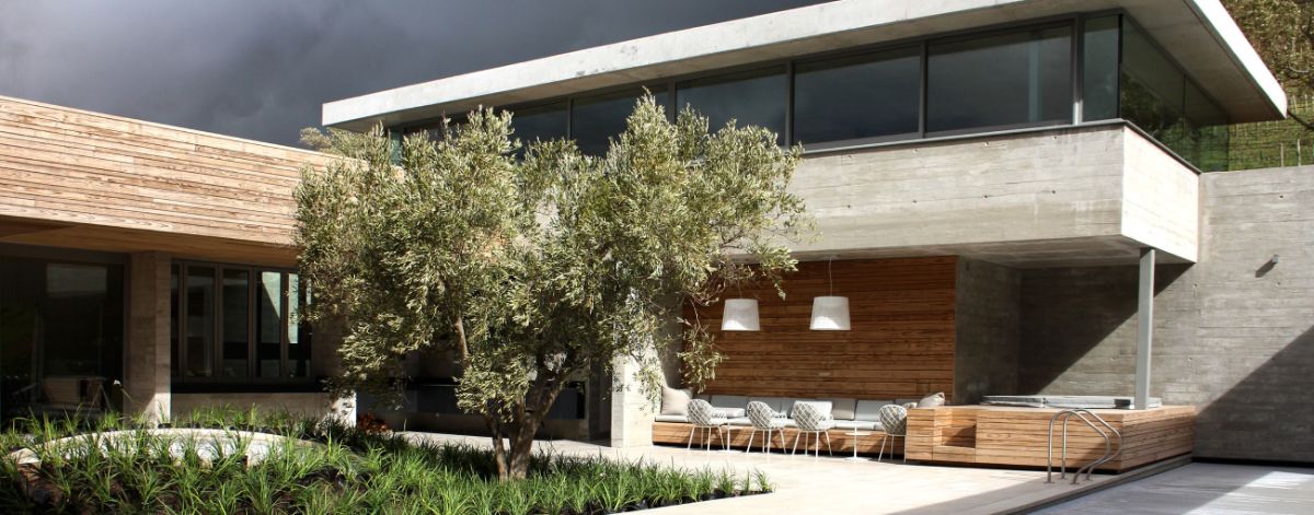 The central courtyard of the shutter concrete block house structure.