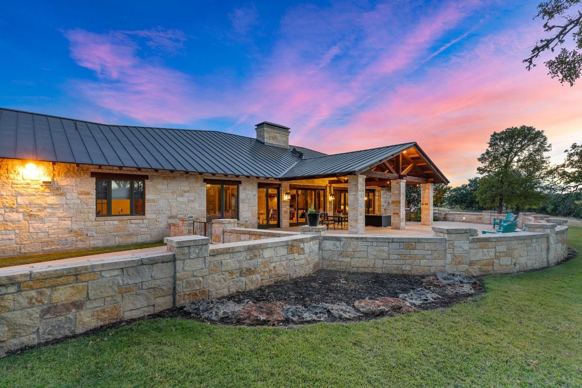 The exterior of the house is made of concrete stones giving of a rough texture and rustic feel.