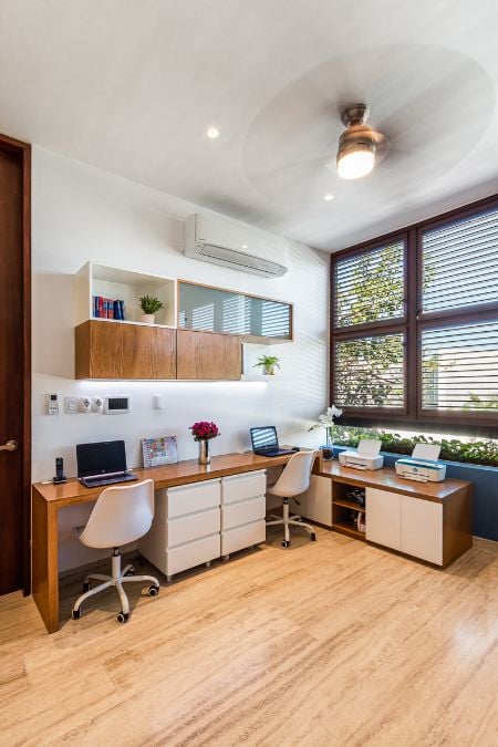 This photograph presents an interior view of the office room, providing a glimpse of the design and layout of the space.