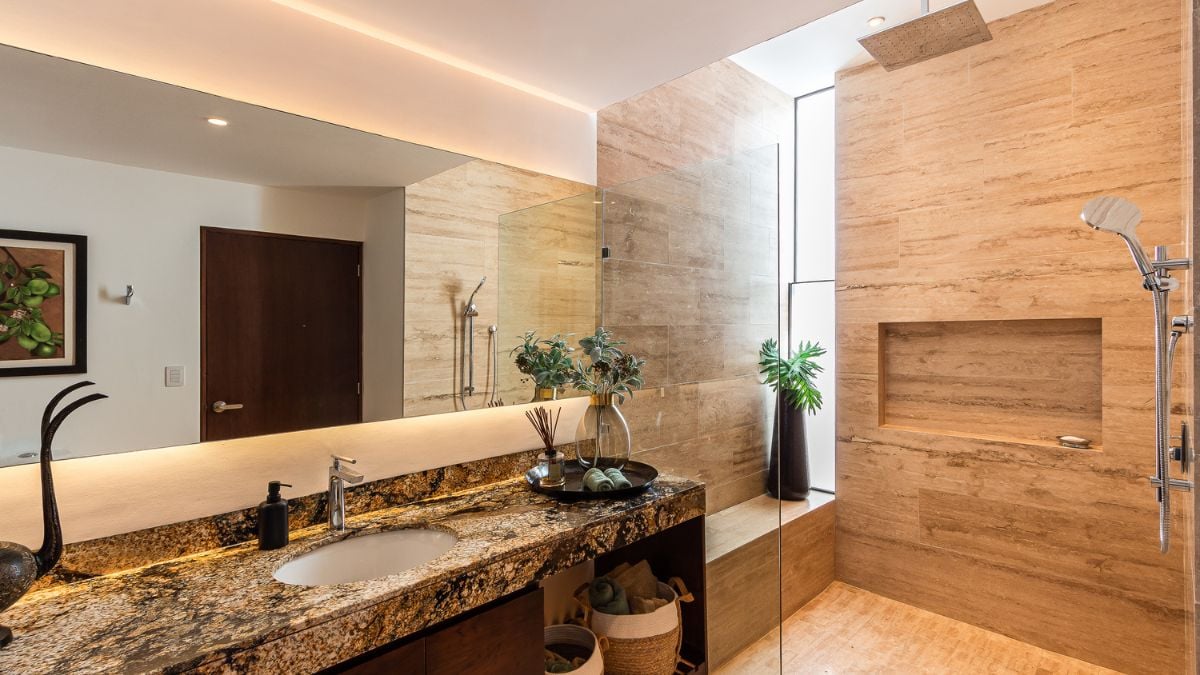 This photograph showcases an interior view of the bathroom, highlighting how its design and features relate to the overall aesthetic of the house.
