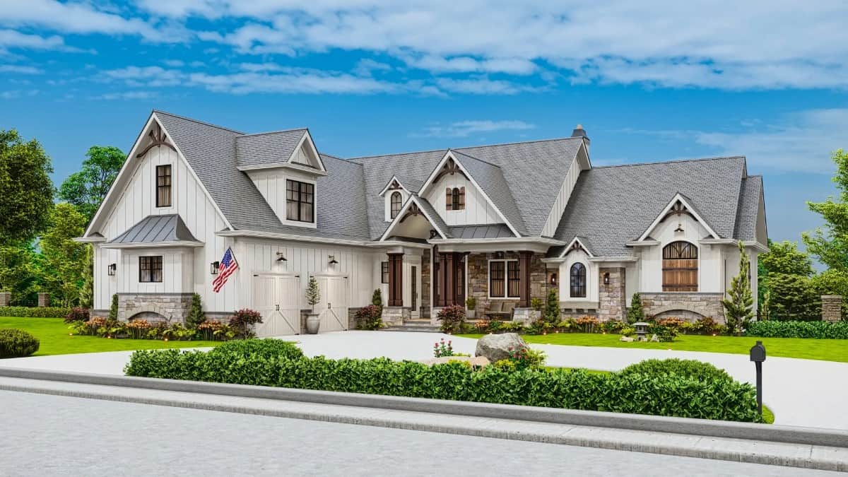 Angled front rendering with multiple gables, a covered entry porch, and a courtyard-entry garage topped with a large dormer.