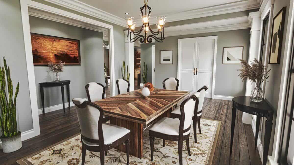A landscape painting mounted above the console table adorns the gallery across the dining area.