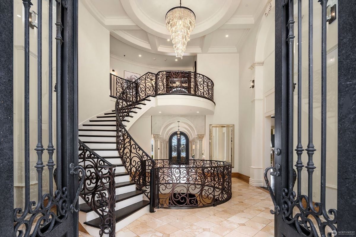 The house features a 20-ft tall entry rotunda decorated with a beautiful chandelier.