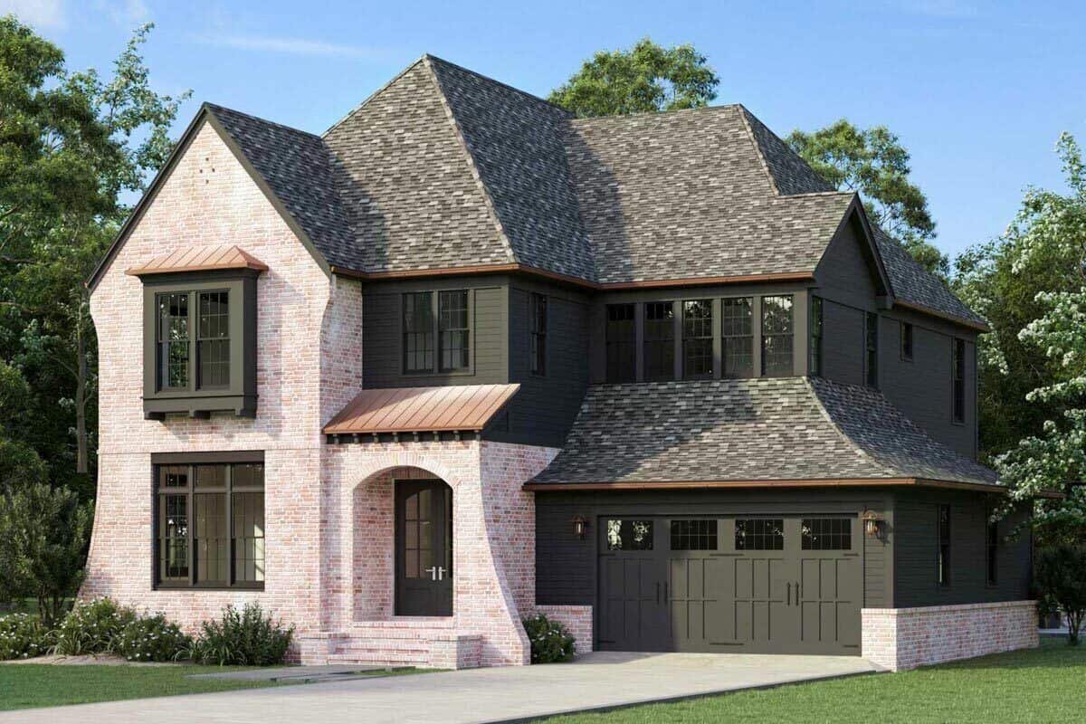 Front rendering with a double garage and a covered entry framed with a brick archway.