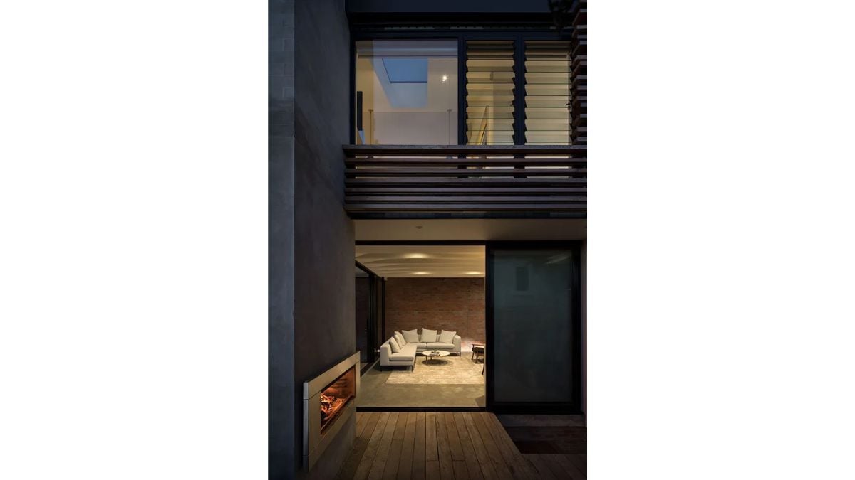 Brick walls serve as North-South structures for the second level to span through, giving the appearance of weightlessness, together with a masonry vertical feature.