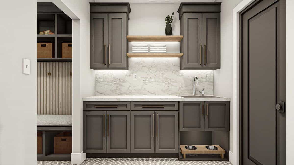 The laundry room features gray cabinets, floating shelves, and a utility sink.