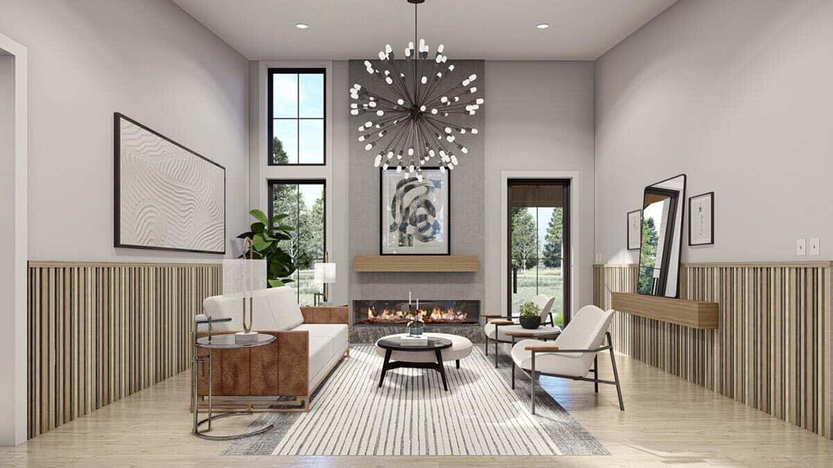The living room features modern seats, a sputnik chandelier, and a fireplace adorned with framed artwork.