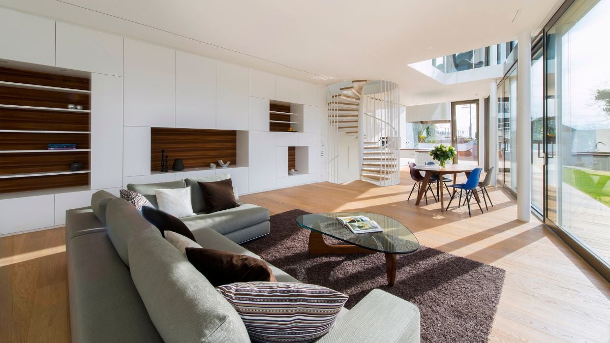 The large living room is open to the dining room and loft-style kitchen on the ground floor.