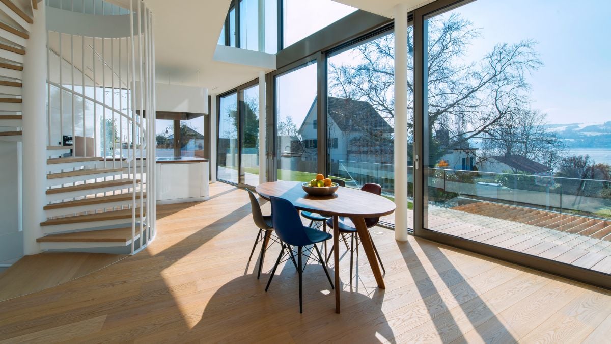 The design contains a double height open space that encourages the gaze to travel rather than walling off separate floors.