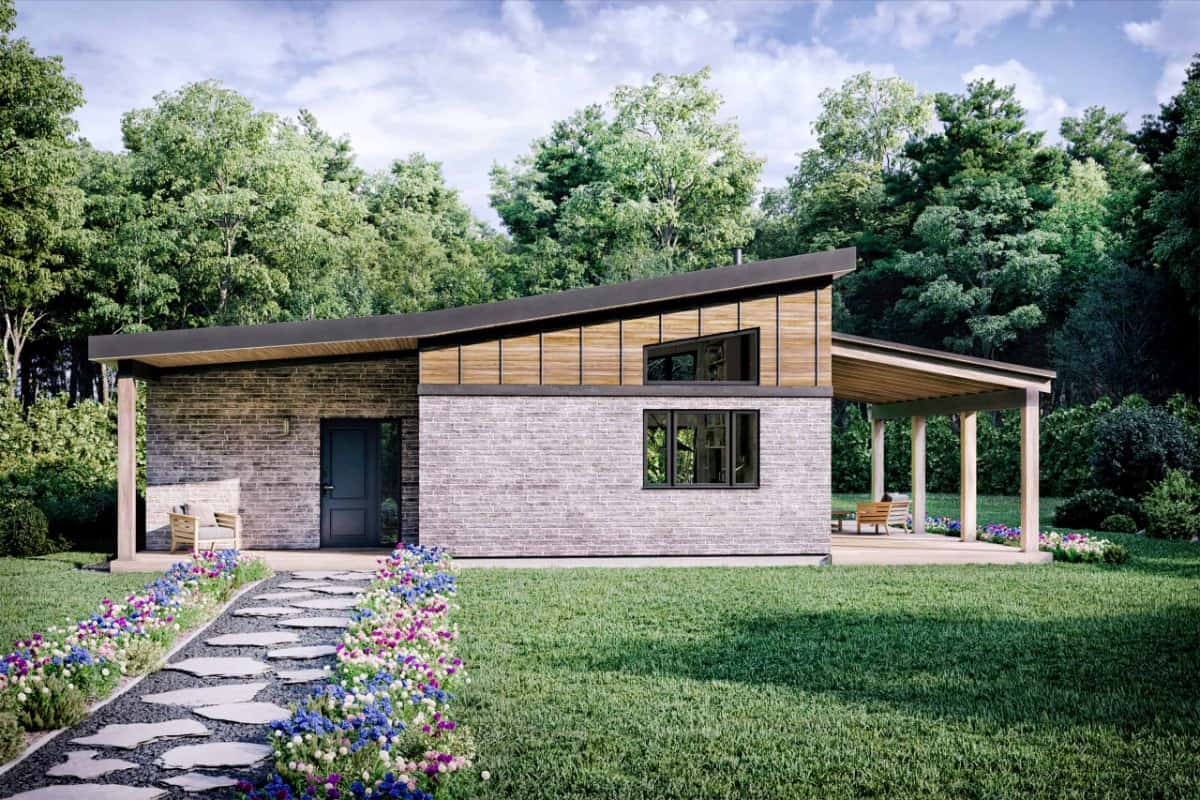 Front rendering with wood and brick cladding, angled rooflines, a side porch, and a covered entry with a black front door.