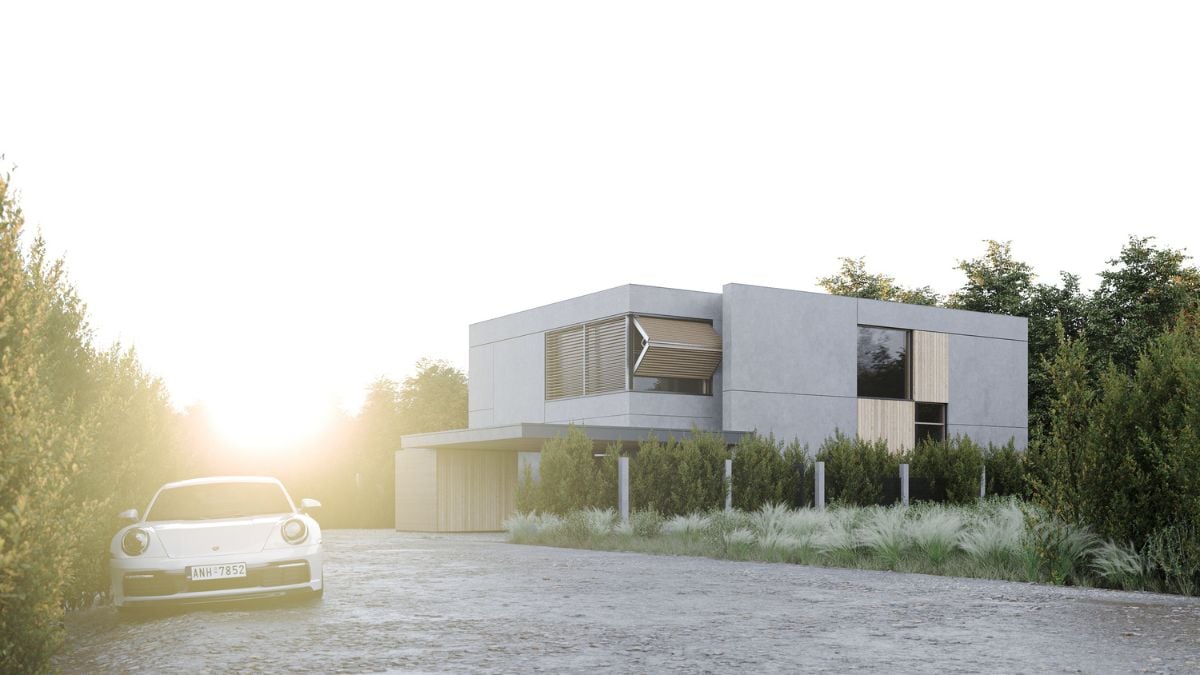 The panoramic shot highlights the entire structure of the house, showcasing its dark gray color and jumbo windows with folding shutters.