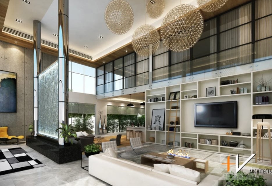 An interior shot of a modern house filled with elegant furniture, decorations, and prestigious hanging lights.