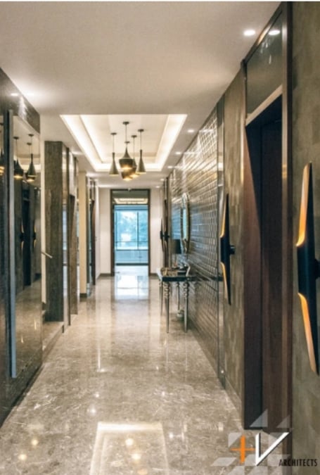 An interior shot of a hallway with several doors, each leading to different rooms in the house.