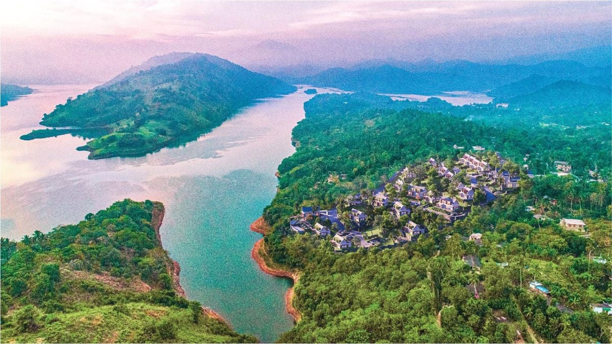 This is an aerial view of a group of lush green islands, surrounded by water. The compound is a picturesque location that offers stunning scenic views.
