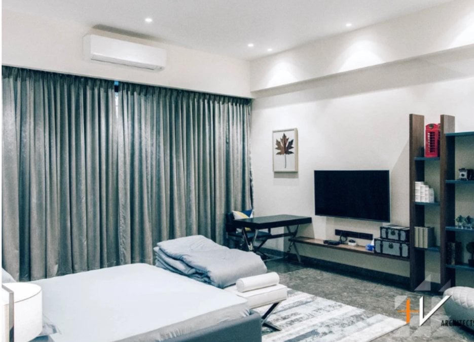 Bedroom is spacious and designed with a gray motif, which contributes to an elegant and subtle look.