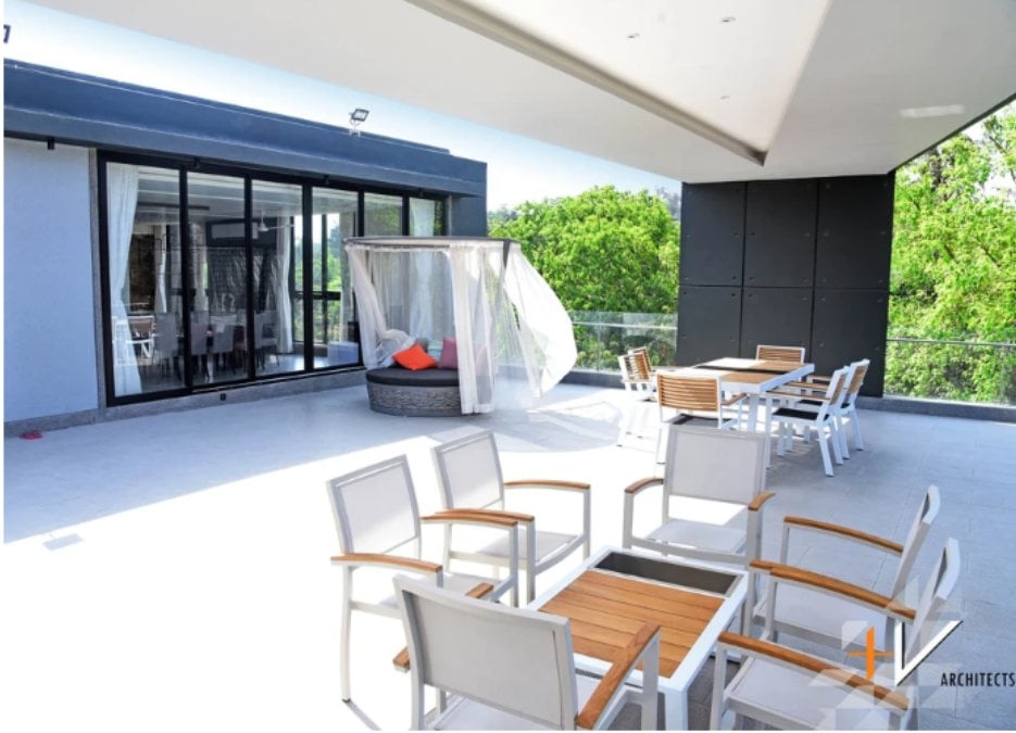 The upper deck is furnished with a pavilion and comfortable seating, providing an ideal setting for guests to relax and enjoy the scenic surroundings and breeze.