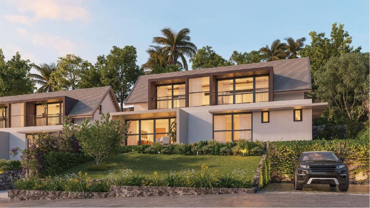 An exterior shot reveals several villas on the island, all with the same architectural design.