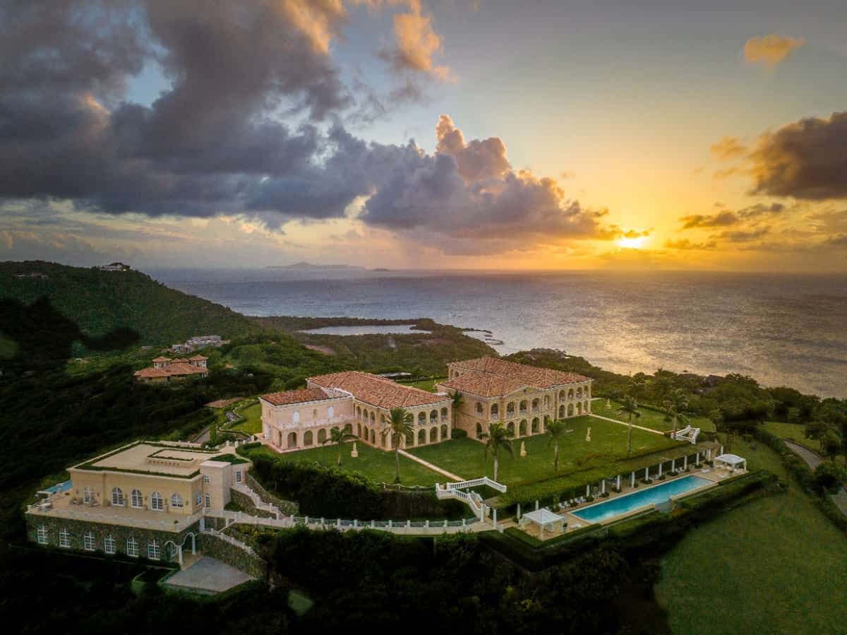 The main home connects to a 12,000-square-foot building, which comes with a huge event hall and game room.