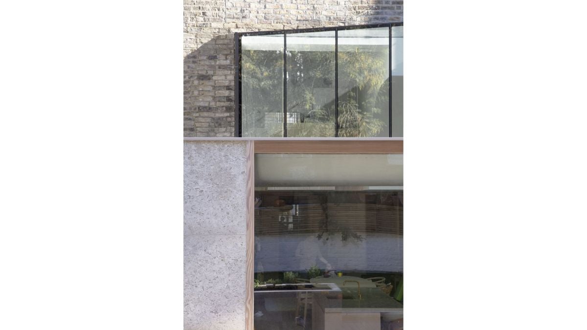 A dramatic vertical space was created by reconfiguring and extending this mid-terrace Victorian house in Brook Green.