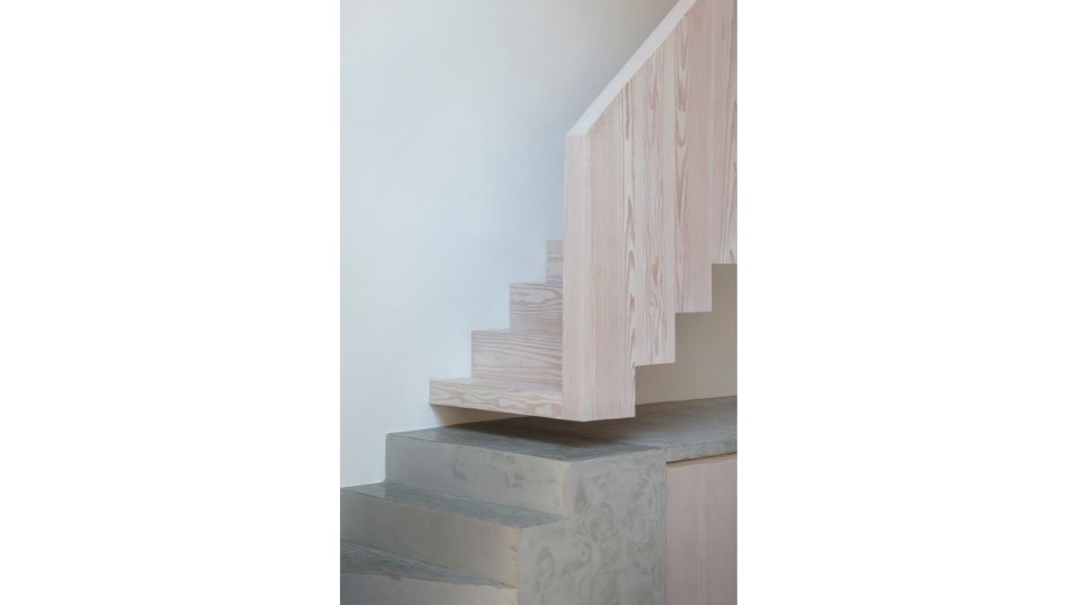 The precast concrete work surface includes the bottom three steps.
