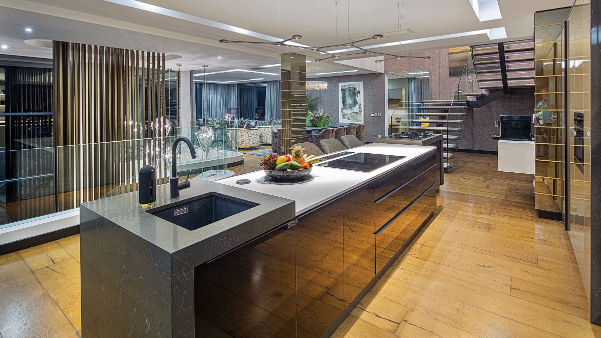 As you enter and ascend the house, the kitchen is the first area you notice.