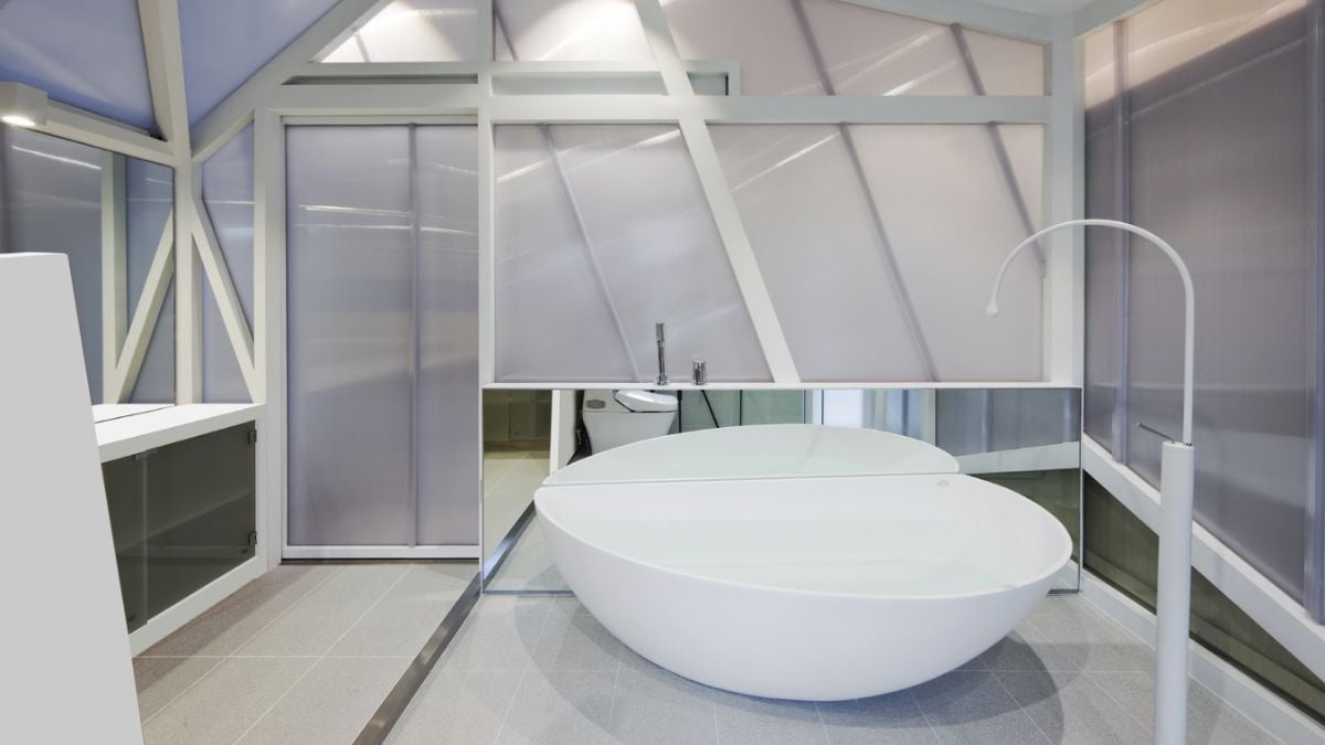 The bathroom has distinct characteristics, including a white design.
