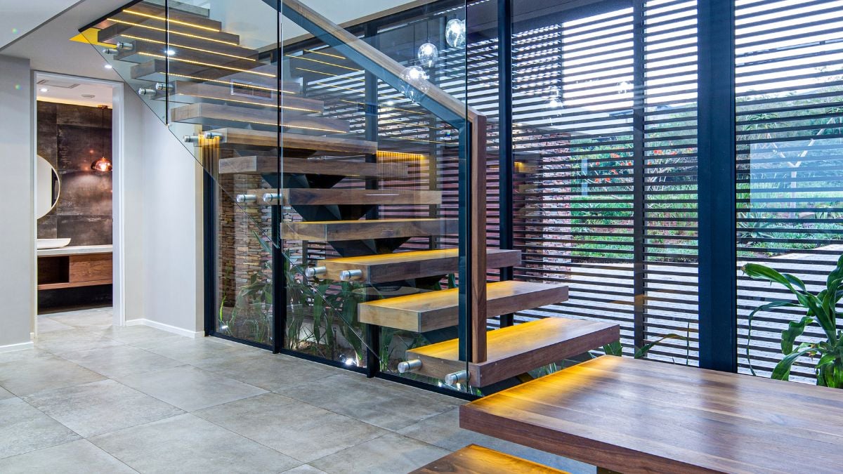 Ascending the spiral staircase to the top floor's private rooms.
