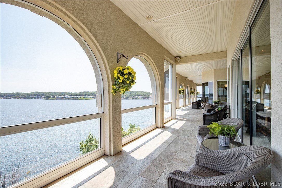 The chairs are placed in front of the arched windows, perfect to showcase the view while taking a break.