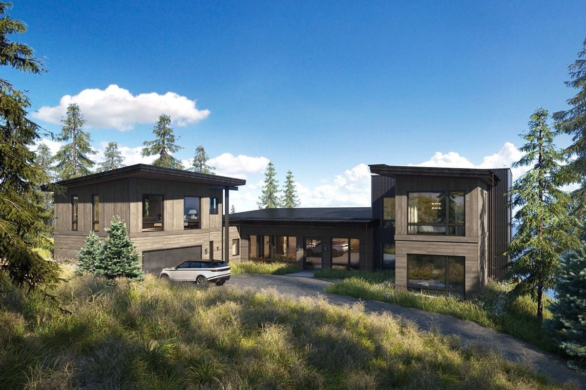 The house features Wood Beams and flooring, natural stones, and custom doors and windows that blend seamlessly.