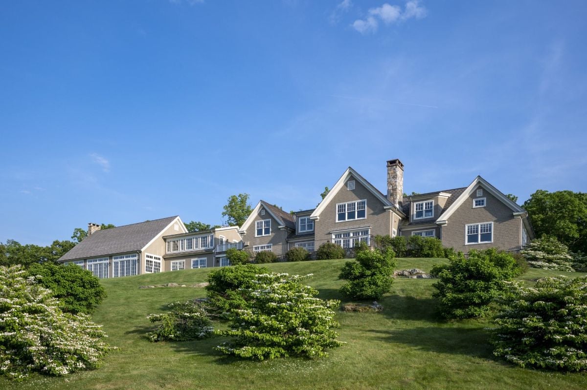 The view of the house and the surrounding trees.