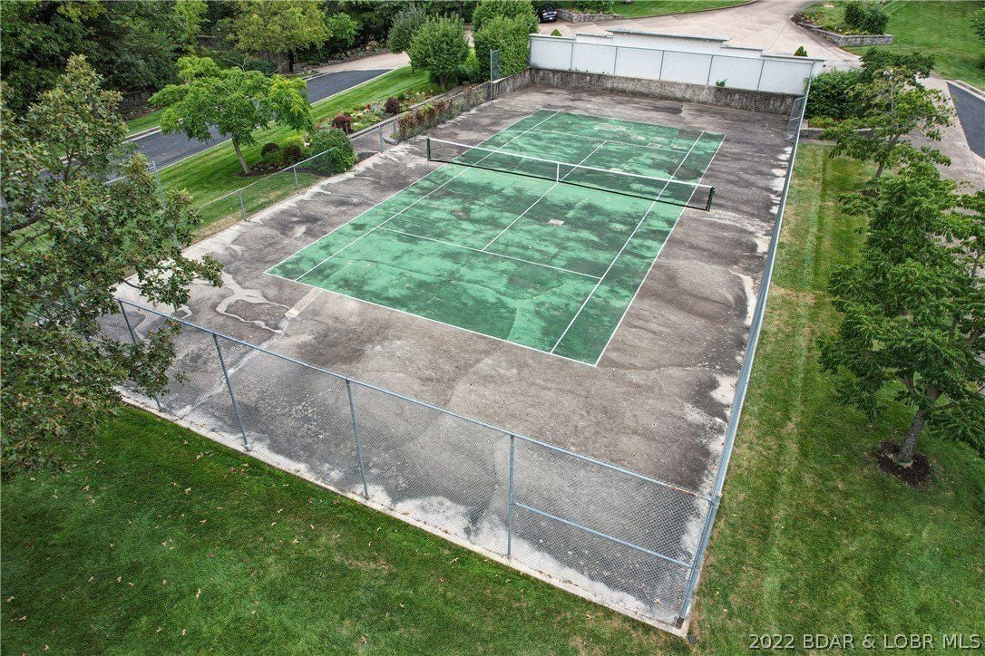 The tennis court is perfect for outdoor activities.
