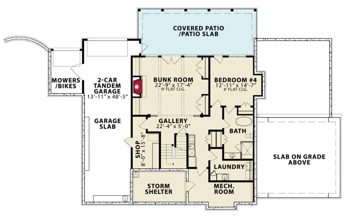 Lower level floor plan with a bunk room, a bedroom, laundry room, a drive-under garage, and plenty of storage space.