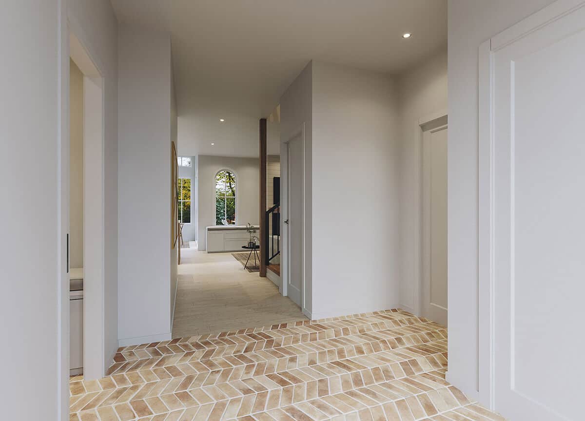A hallway off the foyer leads to the living space.