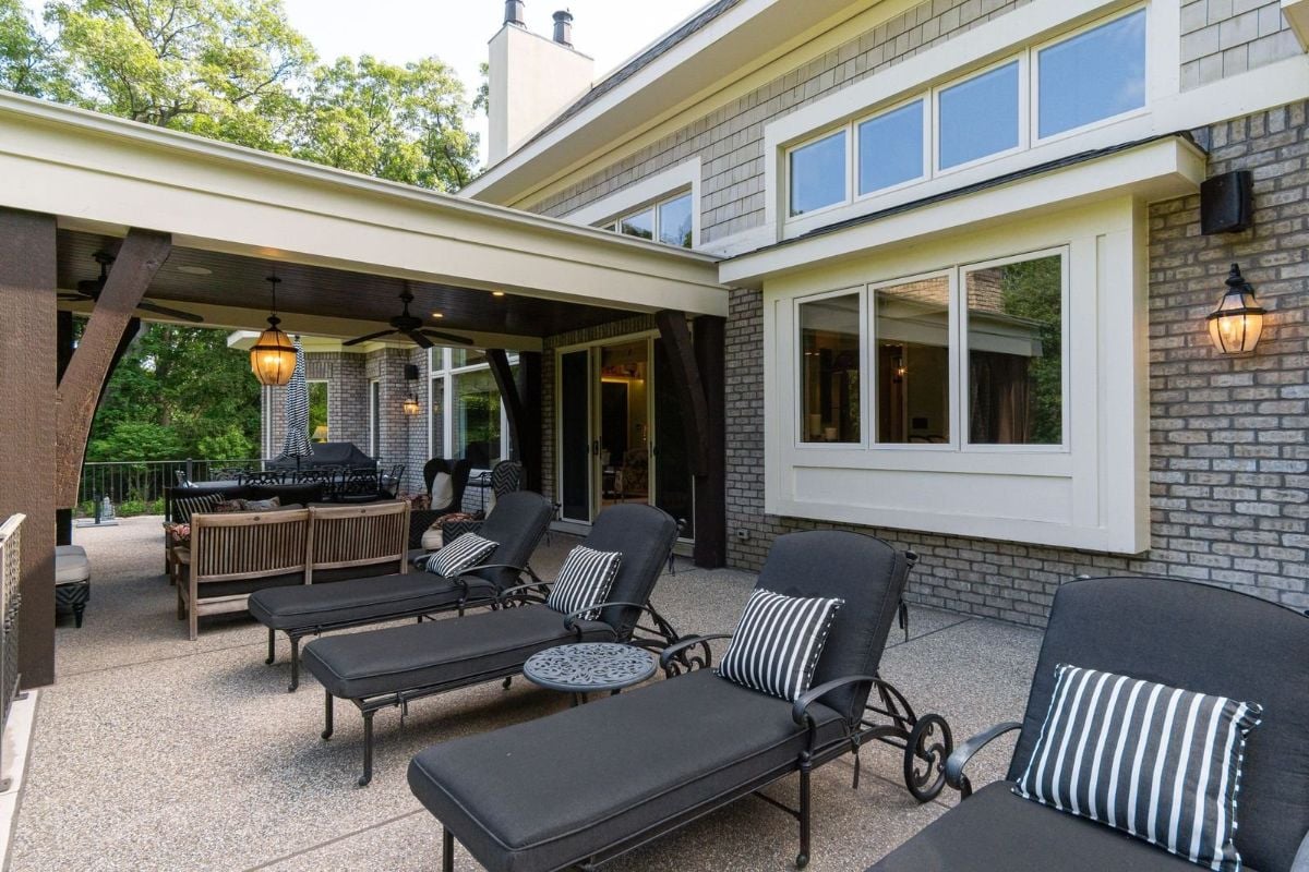The terrace features sunloungers perfectly placed to showcase the surrounding trees.