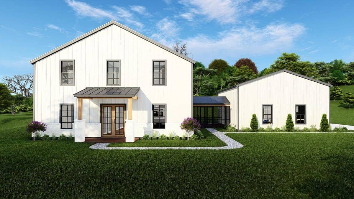 Front rendering with a covered entry porch and a stone walkway leading to the breezeway and garage.