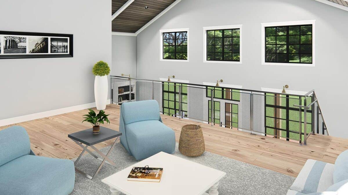 The loft is furnished with blue seats, a white coffee table, and a chrome side table over a gray area rug.