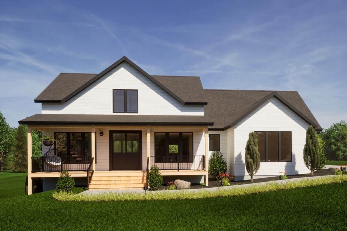 Front rendering with a covered entry deck complemented with a wooden stoop.