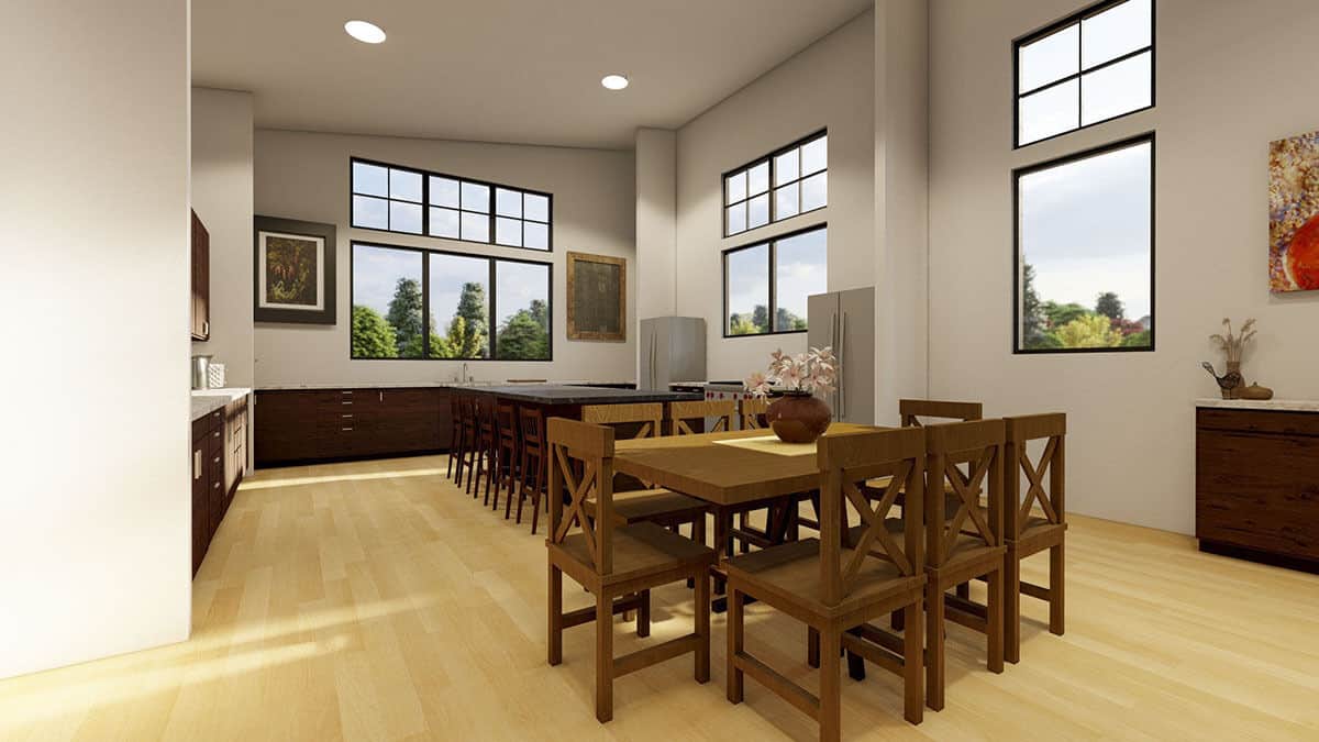 Large windows and clerestories bring ample natural light into the eat-in kitchen.