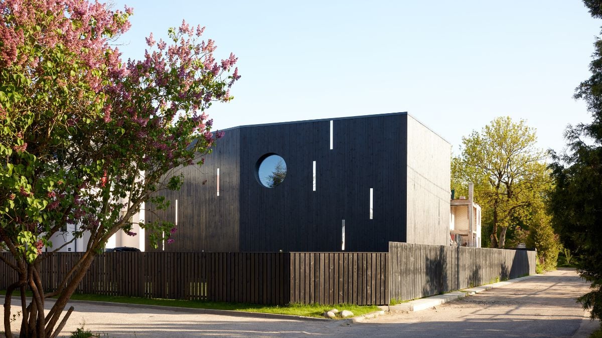 Simple to recognize as a modern building, it forges a fresh architectural path through an older neighborhood of private homes.
