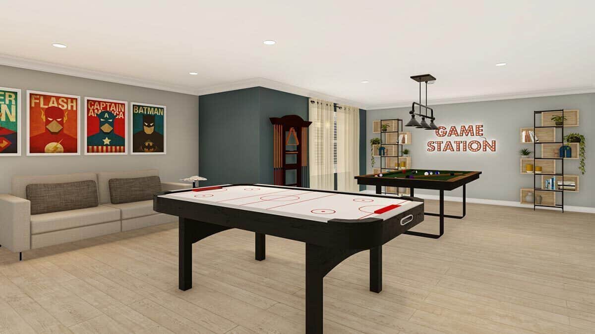 The recreation room is filled with game tables, contemporary shelving units, and a sofa topped with superheroes posters.