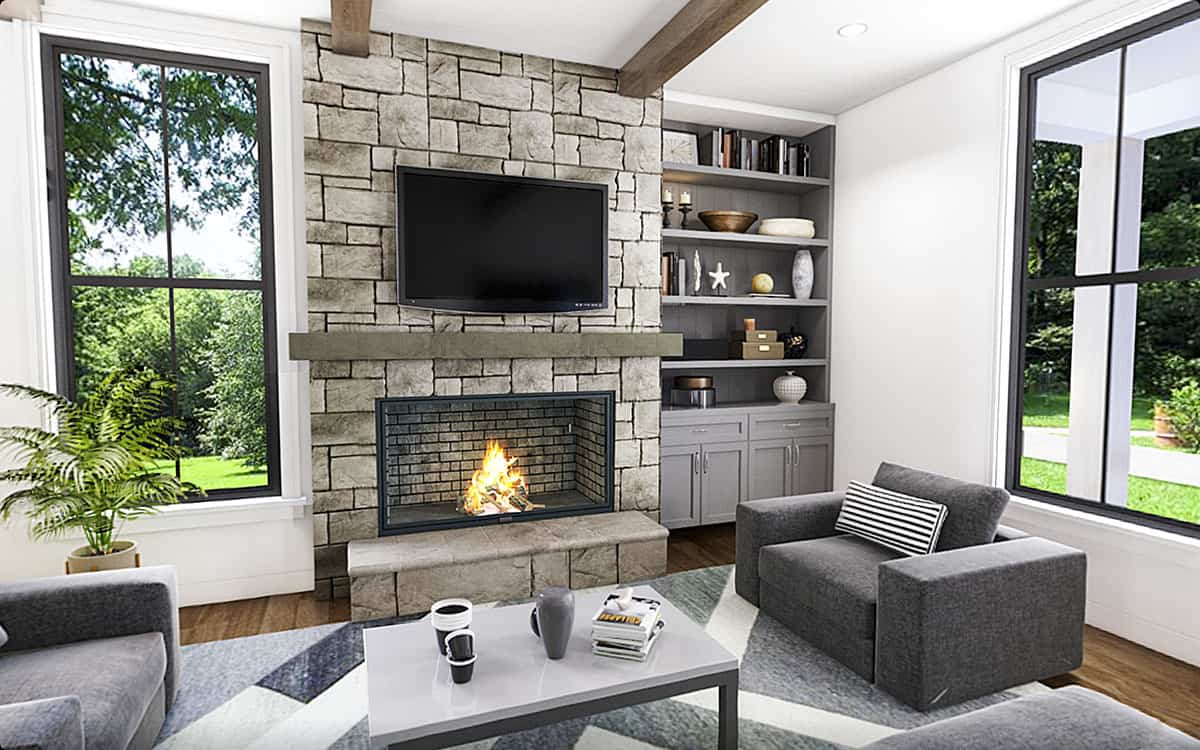 The living room features a stone fireplace topped with a floating shelf and TV.