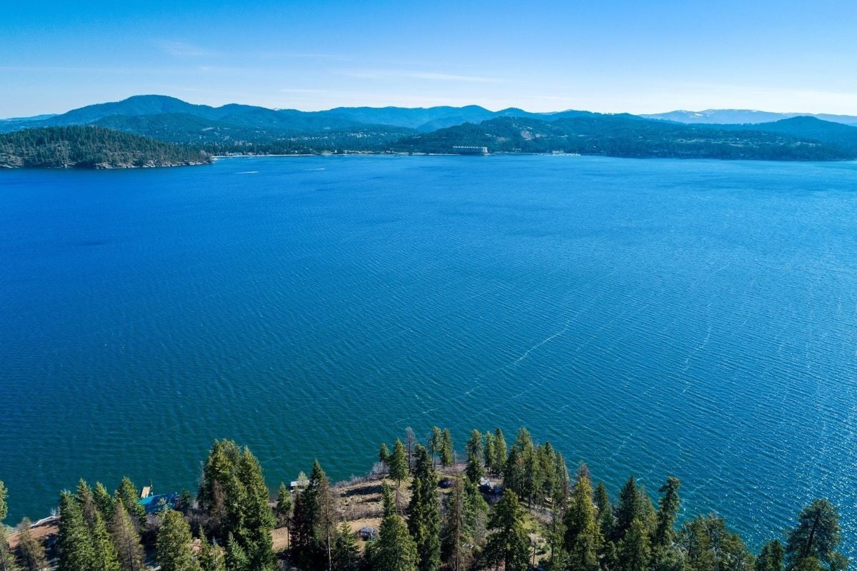Aerial view of the majestic LAKE COEUR D ALENE and the surrounding mountains.
