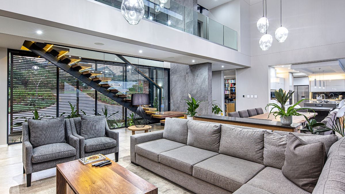 You'll notice a distinct atmosphere as soon as you step into the house because the interior has a specific gray, black, and white color scheme.
