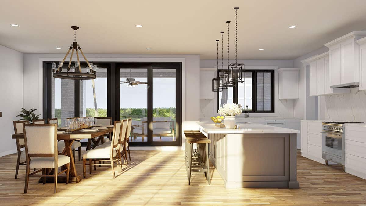 Sliding glass doors extend the eat-in kitchen onto a covered porch.