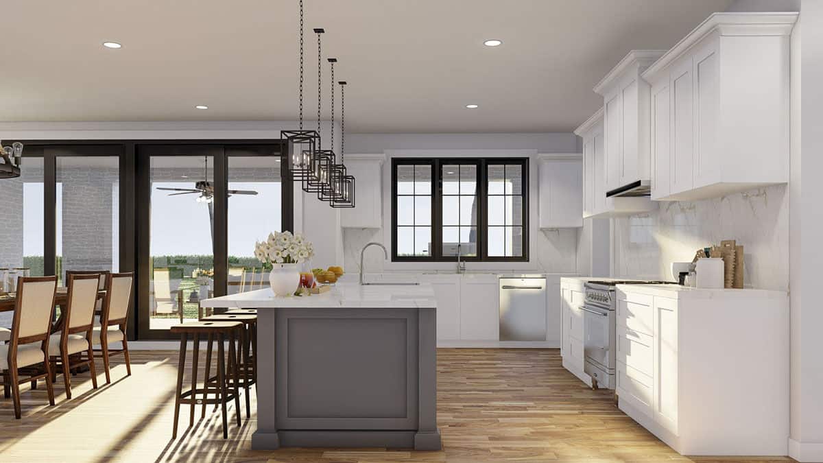 A trio of windows above the sink brings natural light into the kitchen.