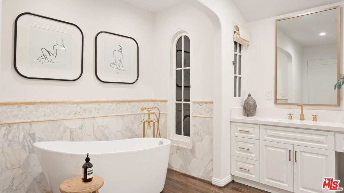 The impressive bathroom suite with freestanding tub and a custom-made vanity.