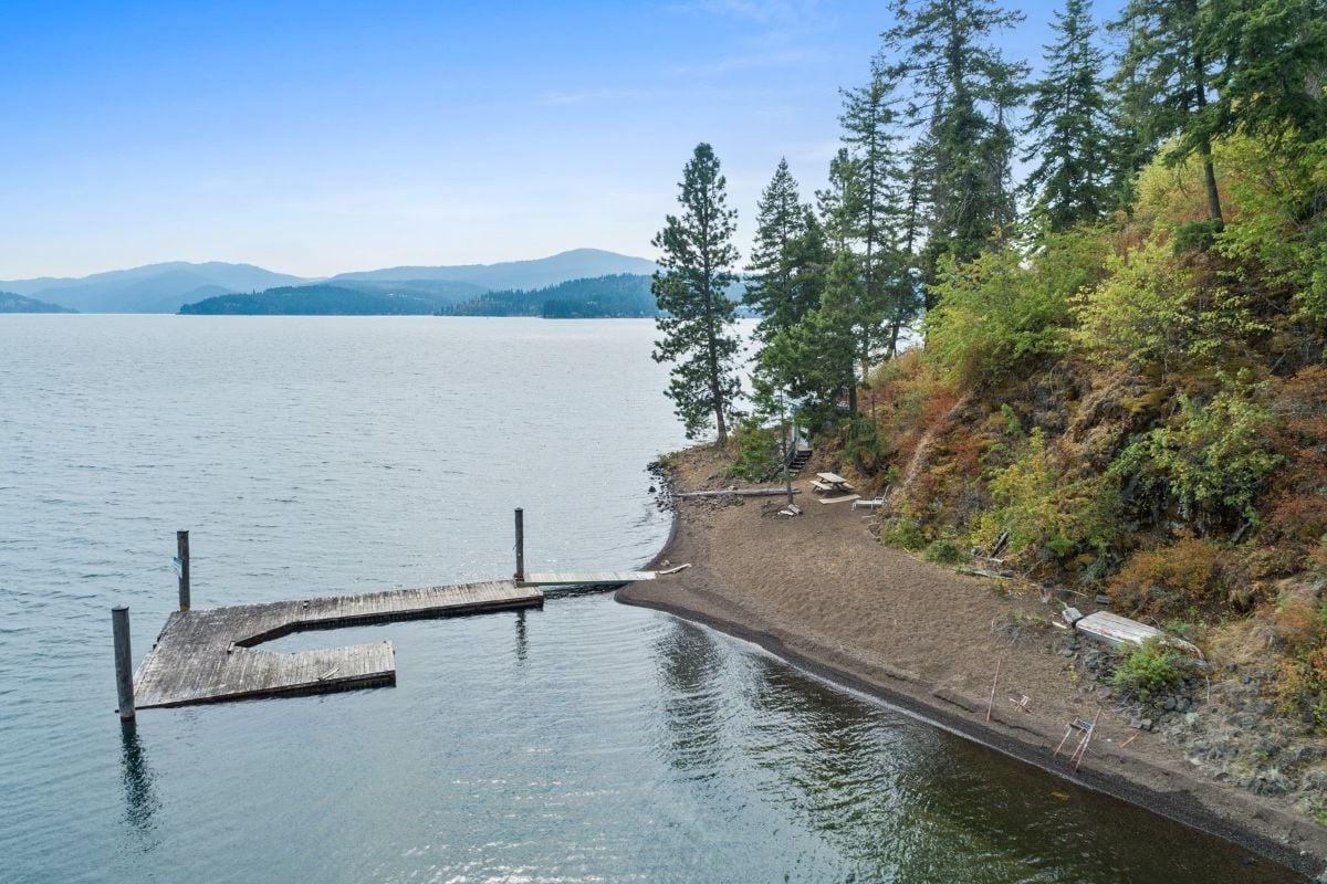 The house features a dock for a small boat.