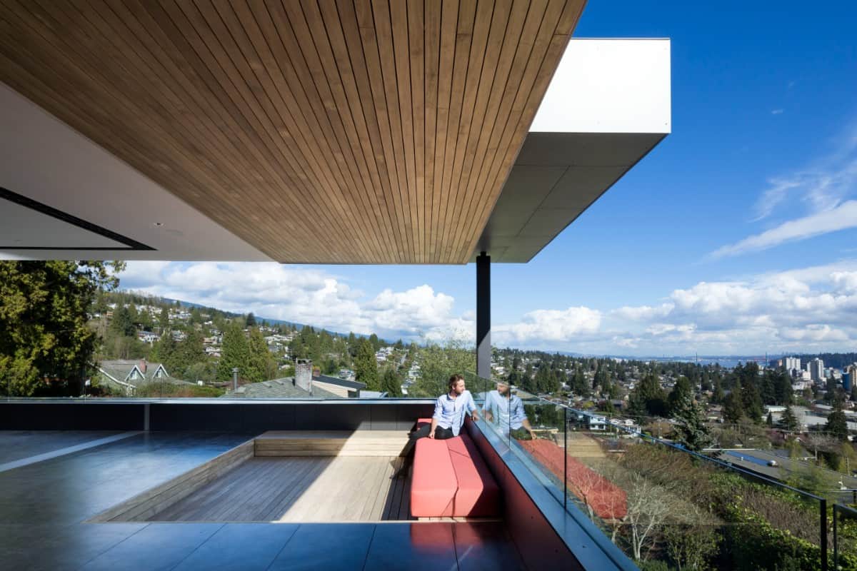 The spacious balcony includes a sunken sitting area perfect for lounging.
